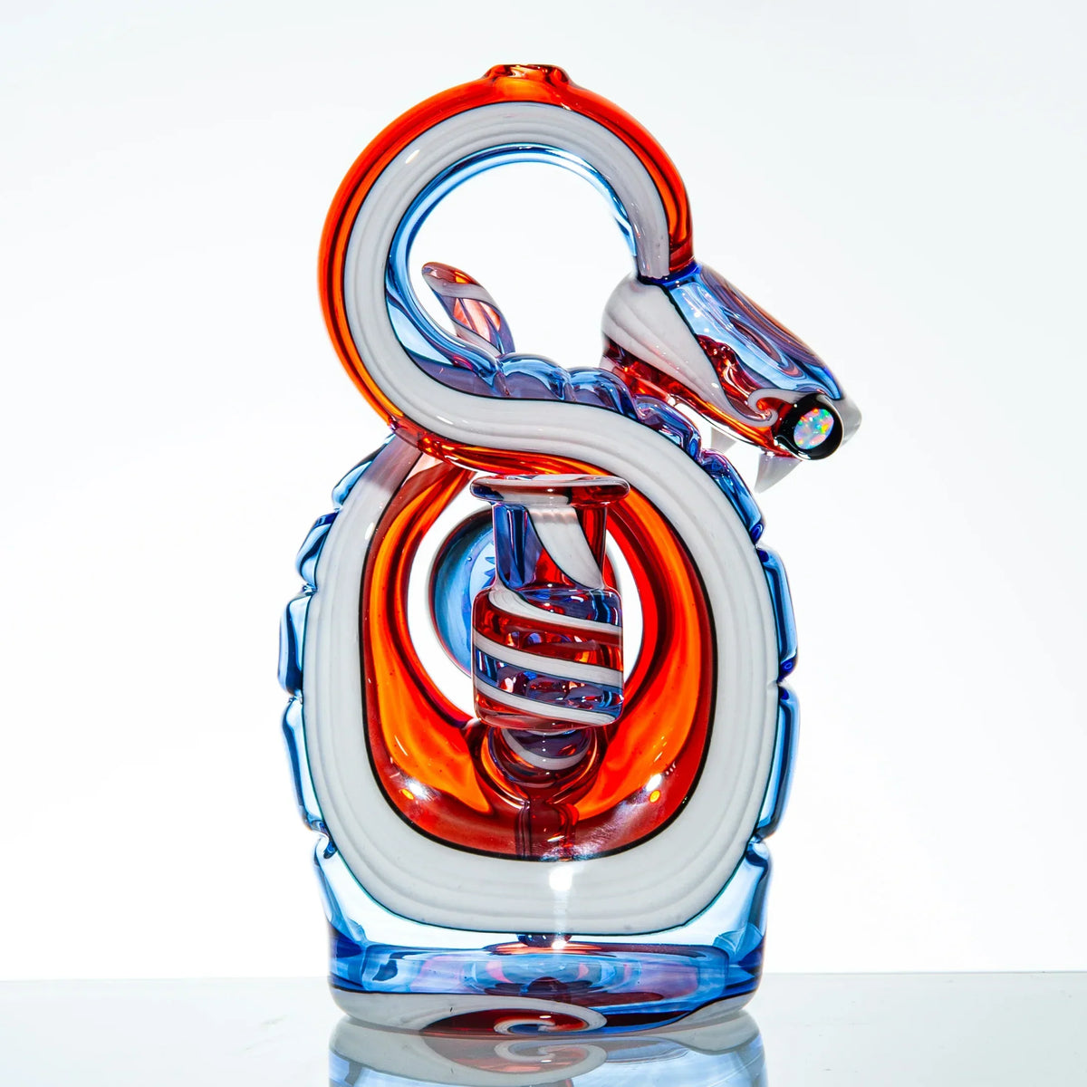 Colorful glass snake-shaped water pipe with red, blue, and white accents