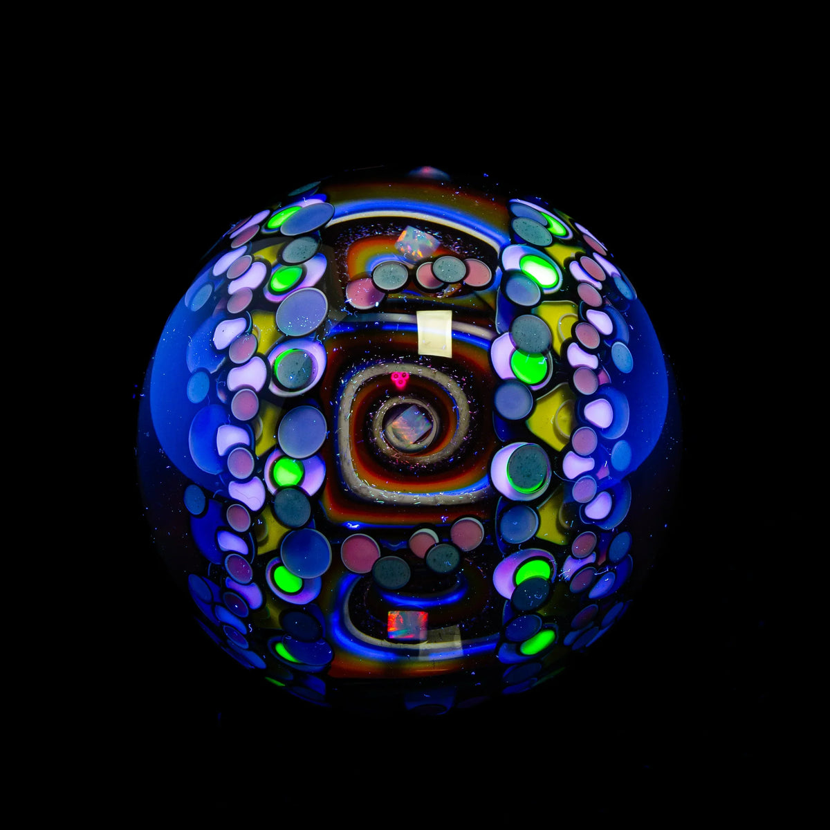 Heady glass marble with vibrant colors, UV-reactive spots, and psychedelic patterns