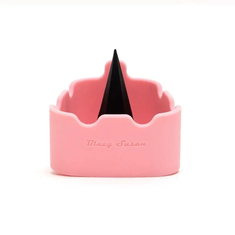 Pink silicone ashtray with central black spike and Blazy Susan text, for smoking accessories