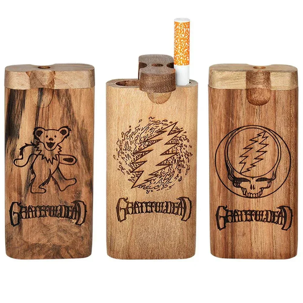Wooden dugouts with Grateful Dead engraved artwork, one with a one hitter pipe visible