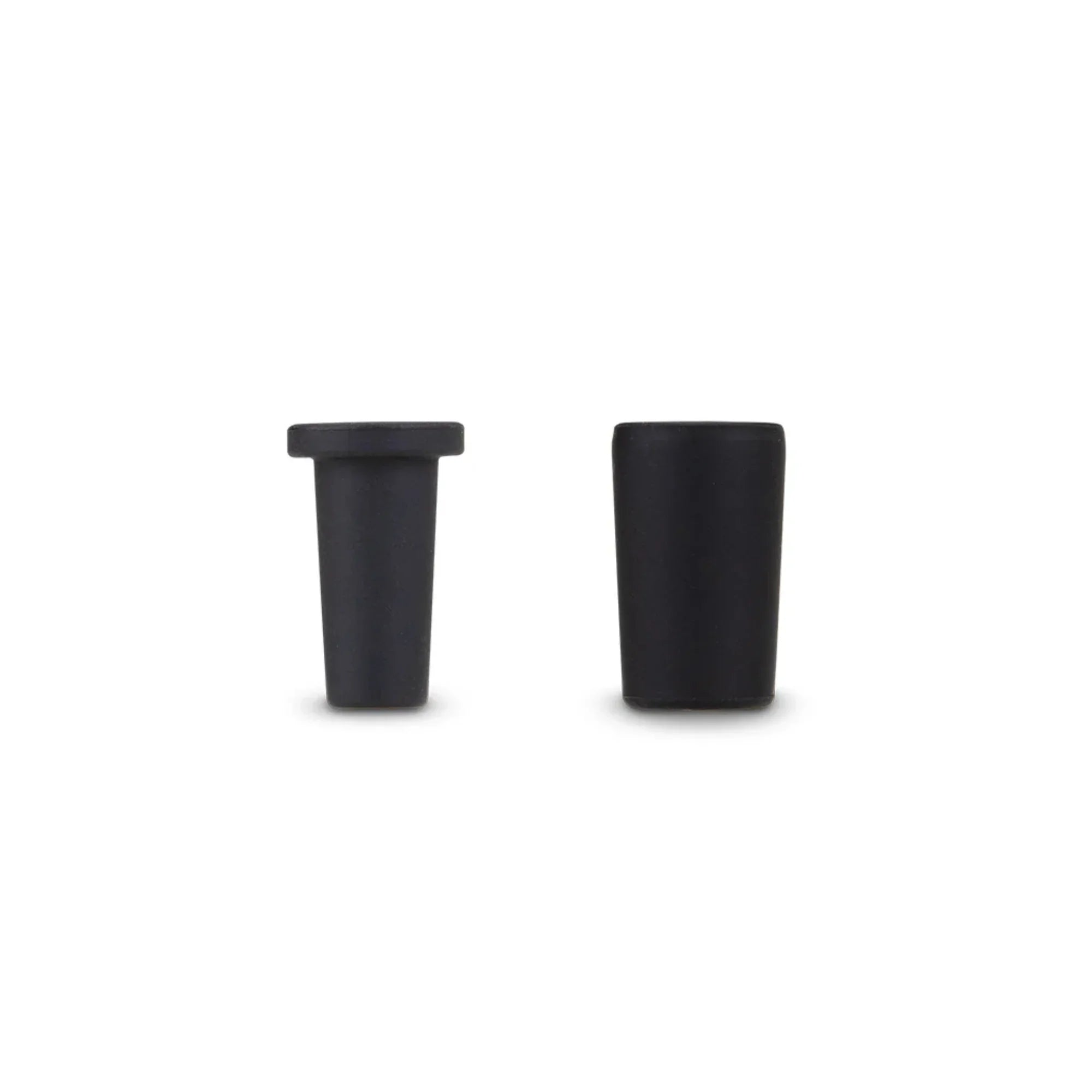 Two black silicone vaporizer accessory caps on a plain white background.