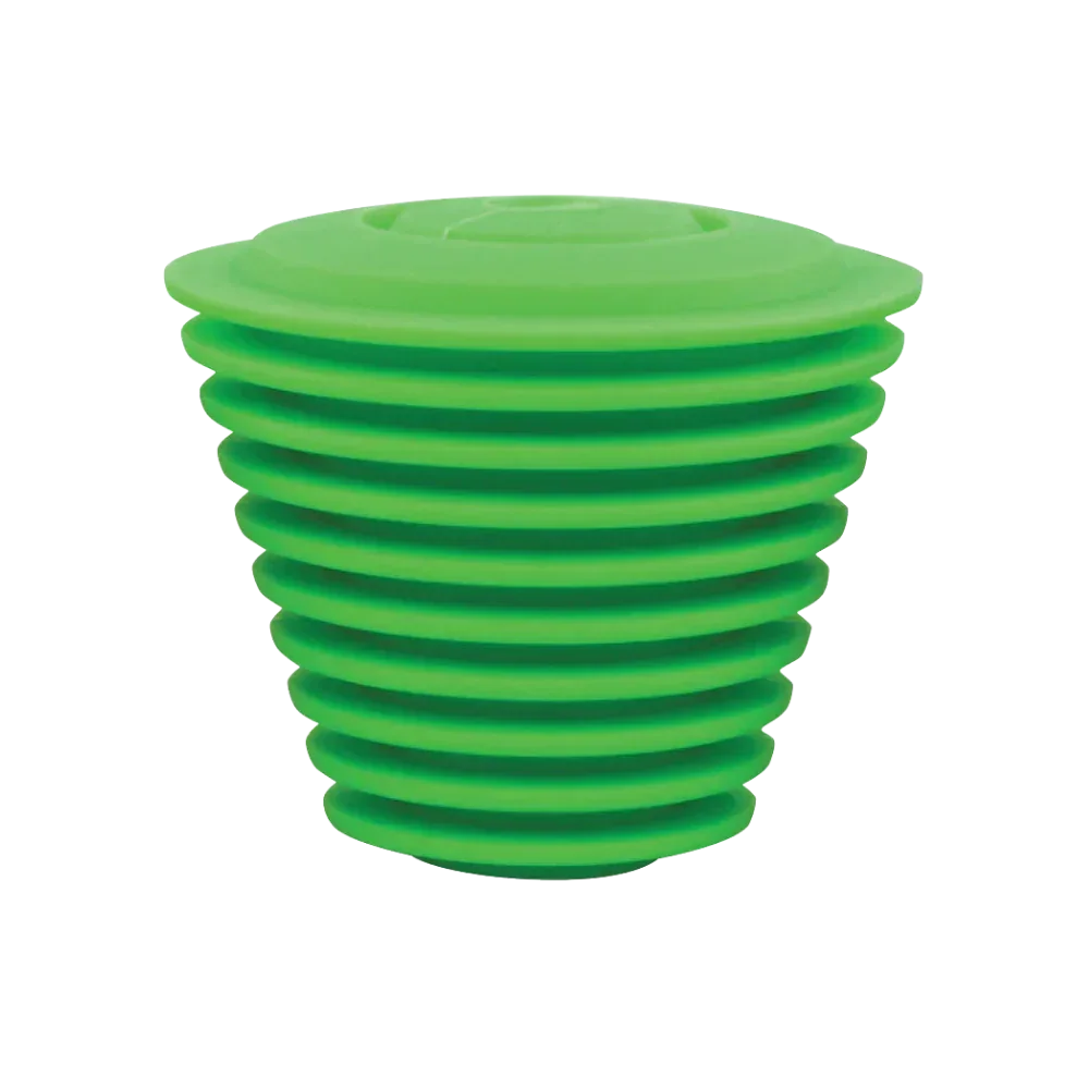 Green silicone ribbed water pipe cleaning plug against white background