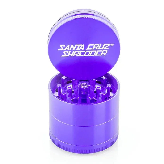 Purple Santa Cruz Shredder herb grinder with open lid and visible sharp teeth