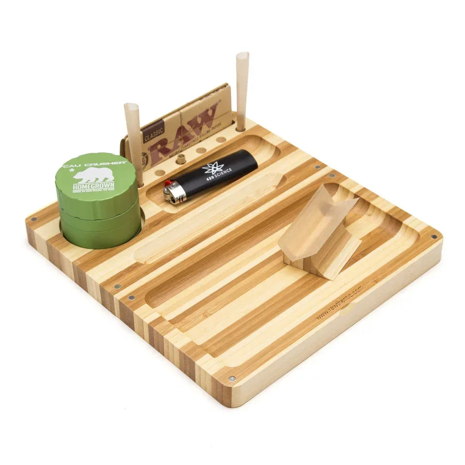 Striped bamboo magnetic rolling tray with storage slots, grinder, lighter, and rolling papers