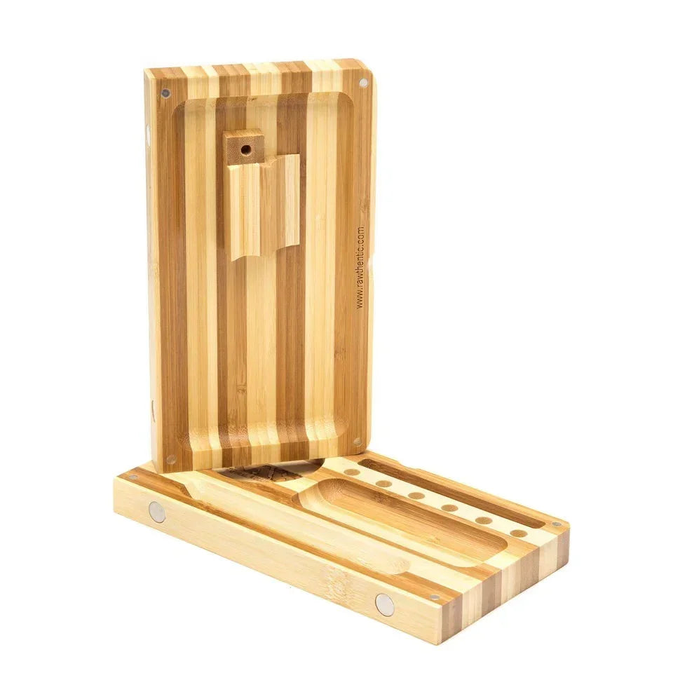 Magnetic bamboo rolling tray with striped wood pattern, open to show compartments and slots