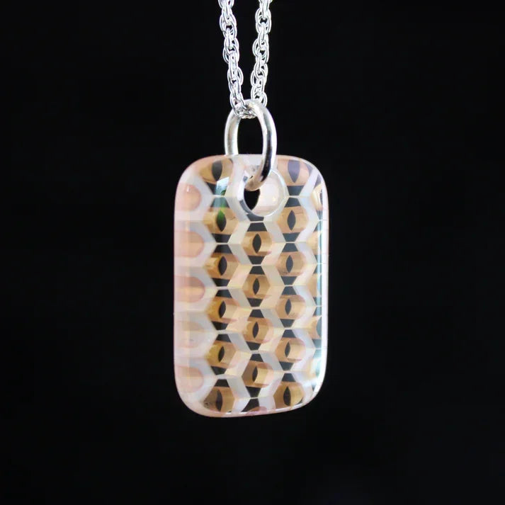 Handmade glass pendant necklace with geometric hexagon pattern on silver chain