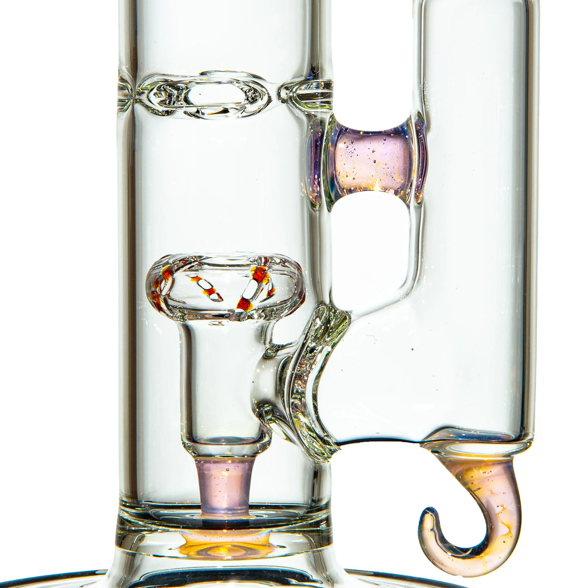Close-up of a heady glass water pipe with intricate percolator and colorful accents.