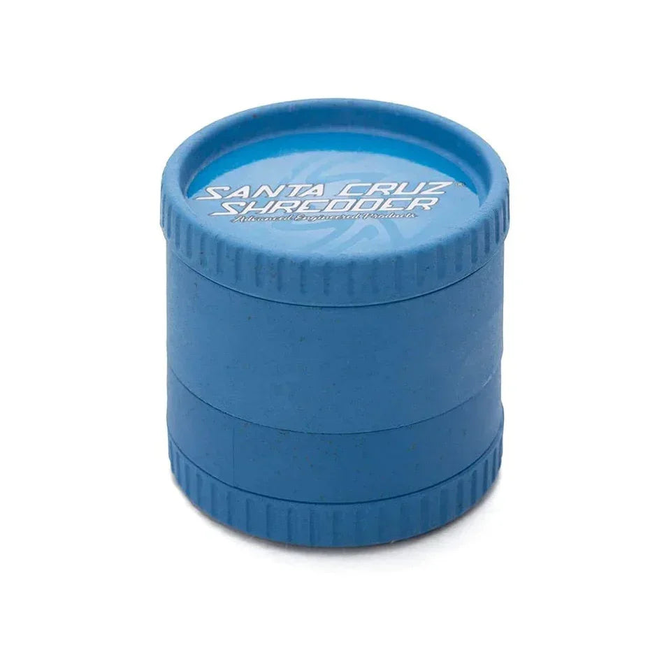 Blue biodegradable hemp 4-piece grinder with textured grip and visible brand logo on lid