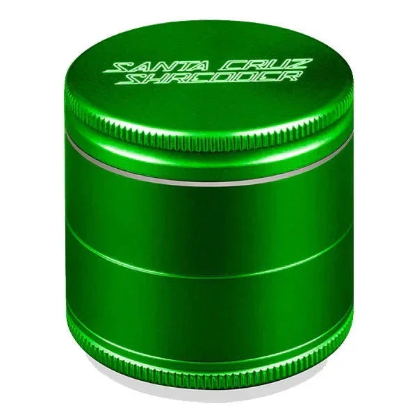 Green metal Santa Cruz Shredder herb grinder with engraved lid on white background