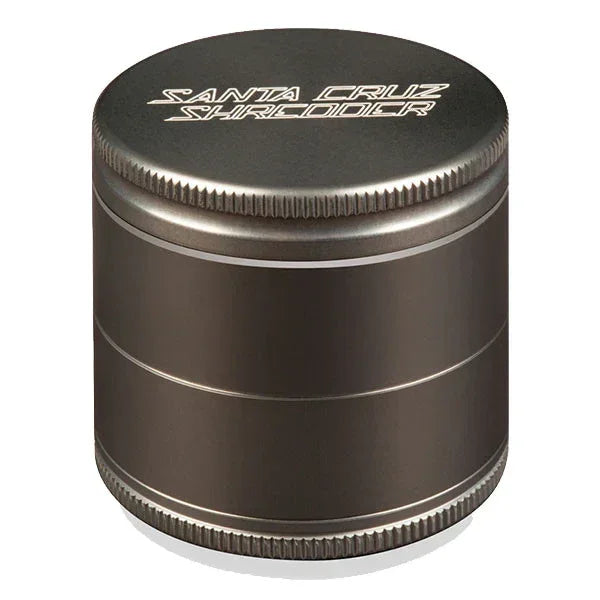 Medium grey metal herb grinder with textured edges and engraved Santa Cruz Shredder logo