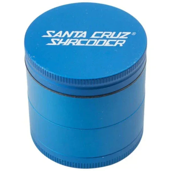Matte blue medium herb grinder with Santa Cruz Shredder logo on the lid