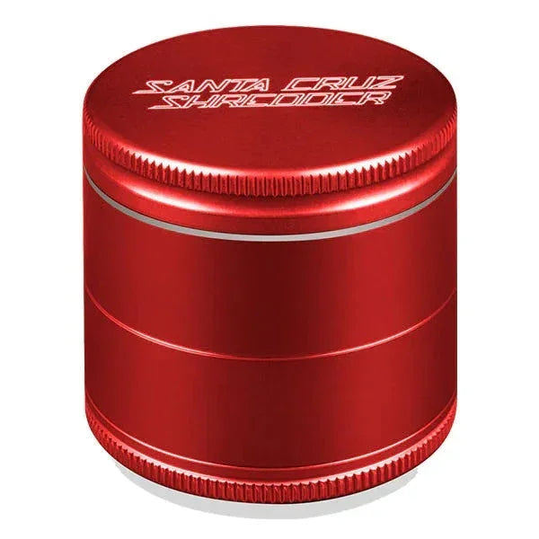 Red Santa Cruz Shredder medium-sized aluminum herb grinder with engraved lid on white background.