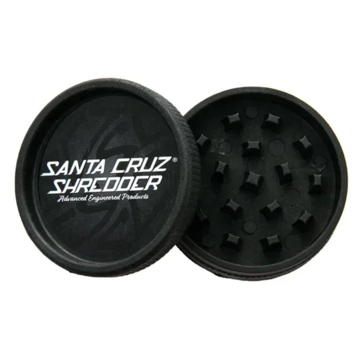 Black two-piece herb grinder with textured teeth and Santa Cruz Shredder logo on the lid