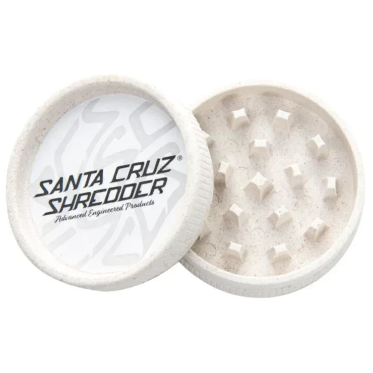 White hemp grinder with textured teeth and visible Santa Cruz Shredder logo on lid