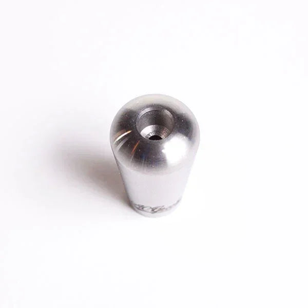 Polished metal bowl piece for glass pipe on white background, smoking accessory