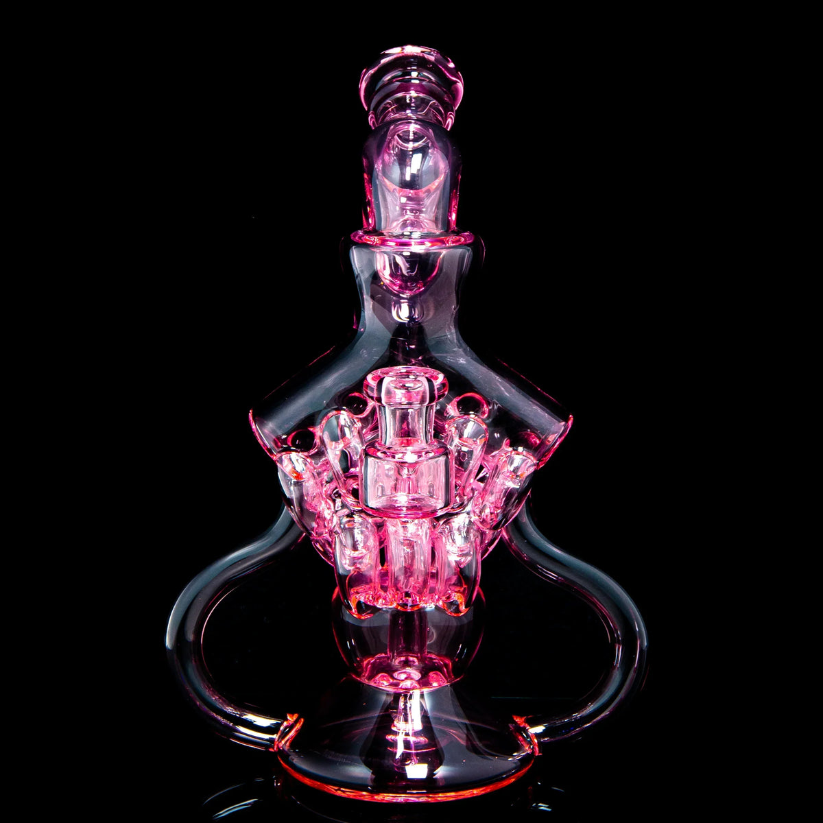 Intricate pink glass water pipe with detailed percolator on a black background