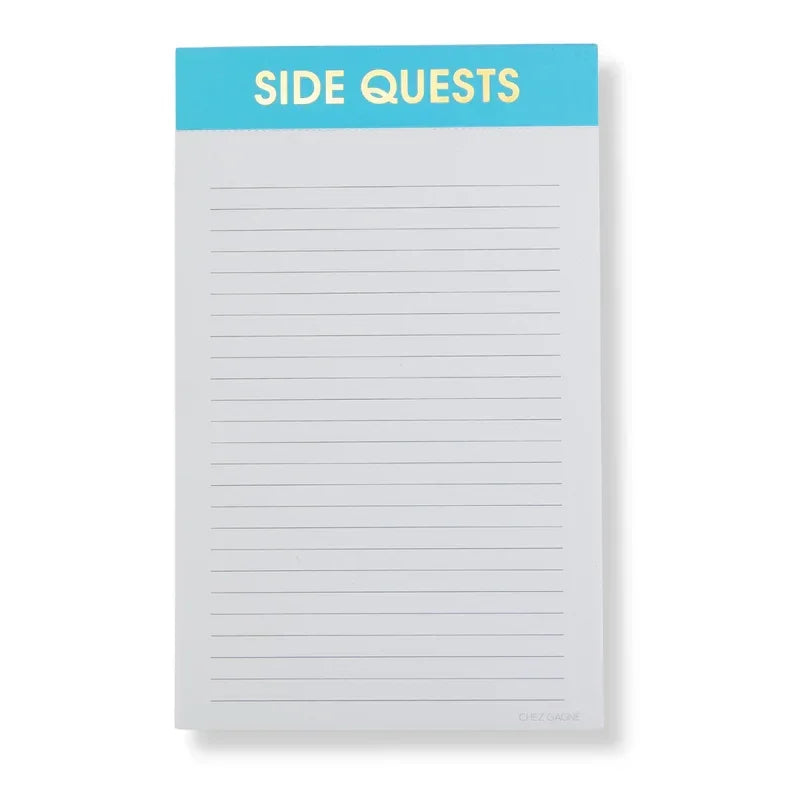 Lined notepad with blue header labeled 'Side Quests', stationery for notes or lists