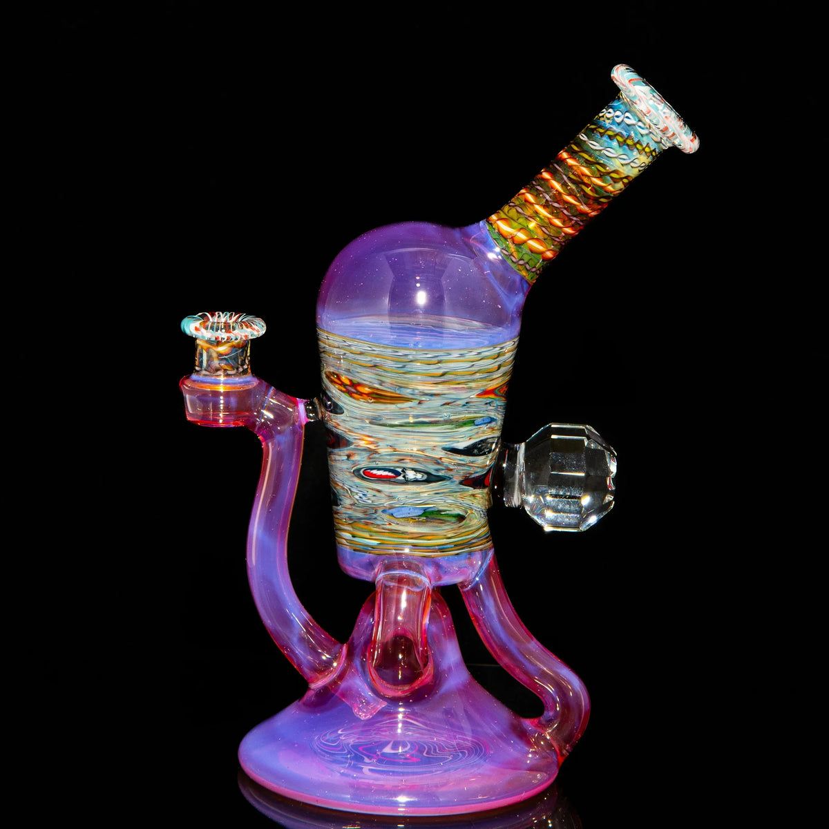Heady glass water pipe with colorful swirls and intricate design on a black background.