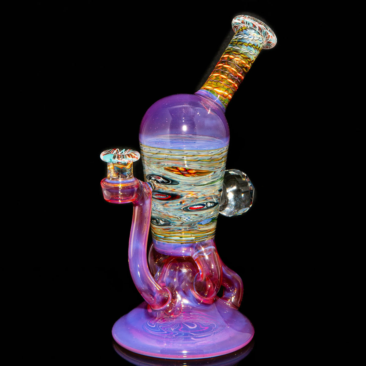 Heady glass water pipe with vibrant colors, swirl patterns, and intricate glasswork design.