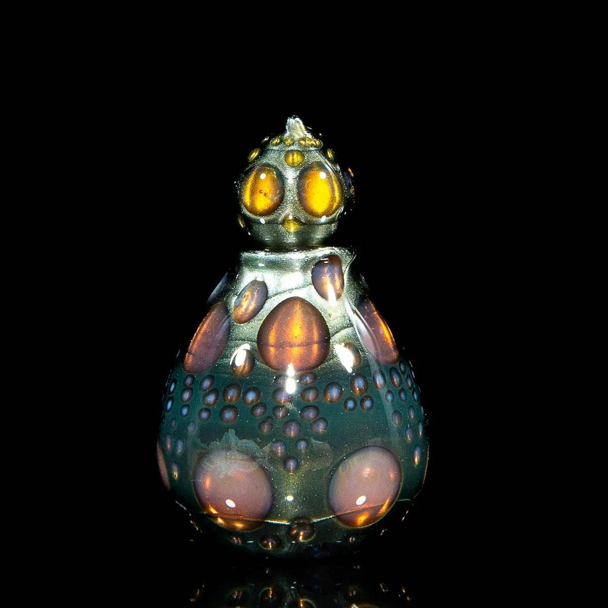 Heady glass art with multicolored bubble accents on a black background