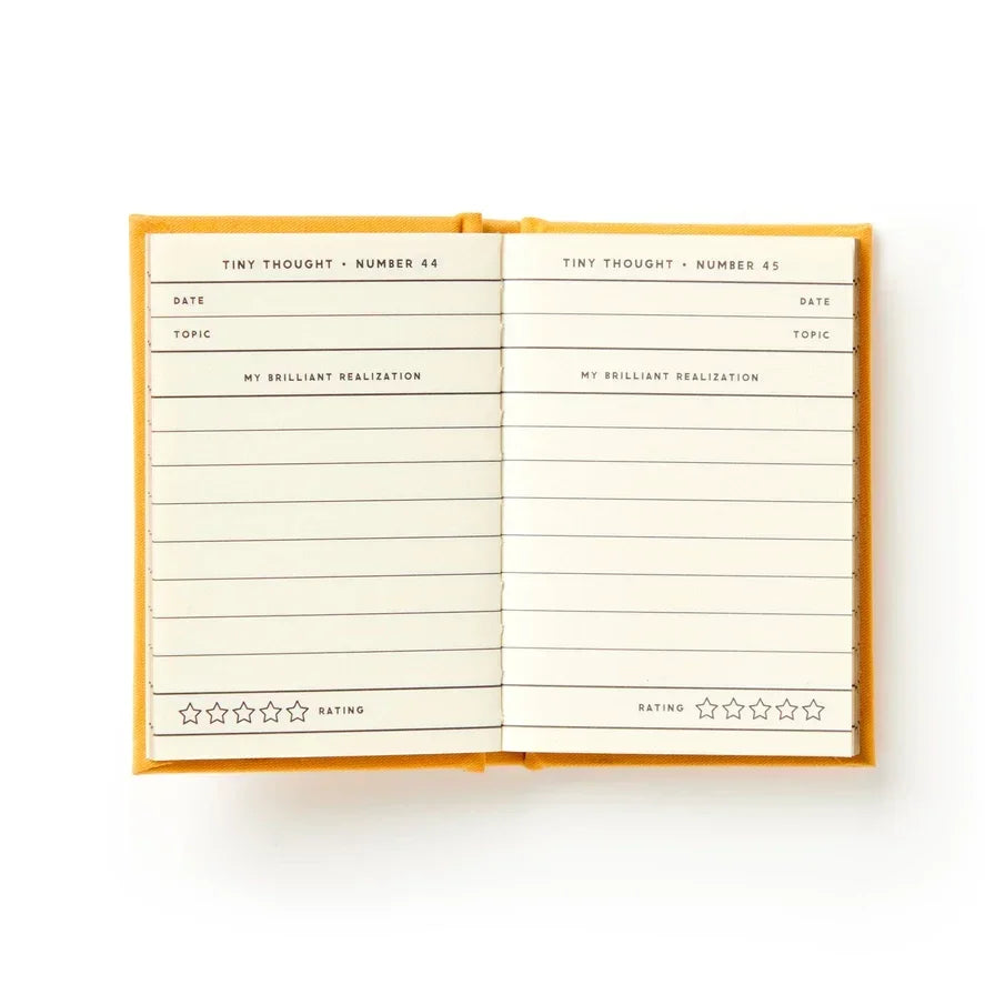 Open yellow journal with lined pages for tiny thoughts, date, topic, and star rating sections