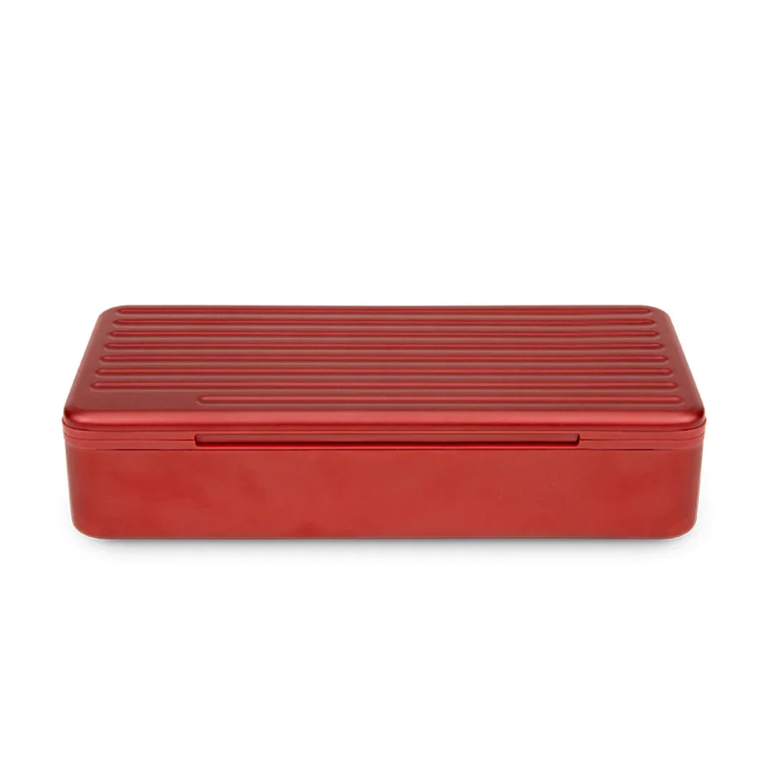 Red hard-shell travel case with a textured, ridged lid, designed for secure accessory storage.