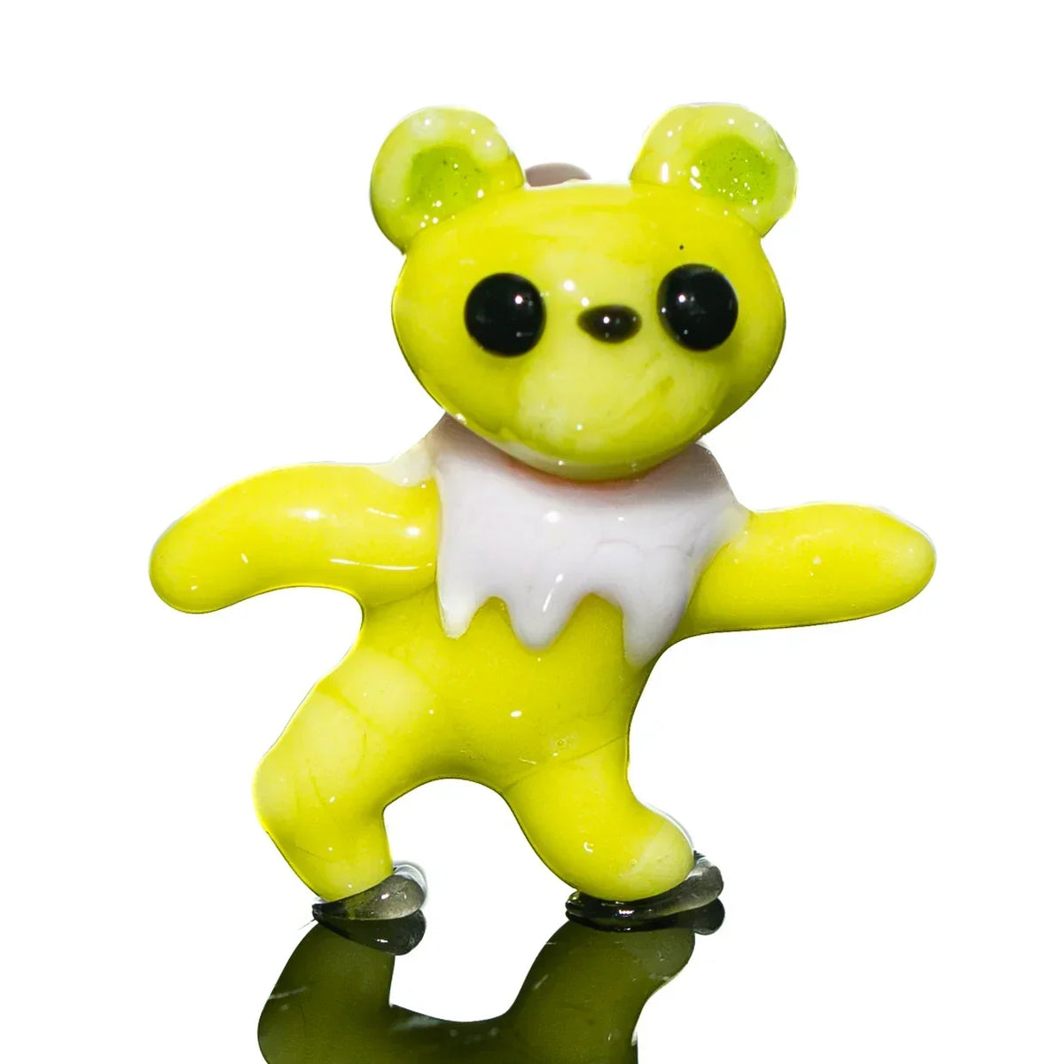 Yellow glass bear figurine with white collar, handcrafted collectible art piece