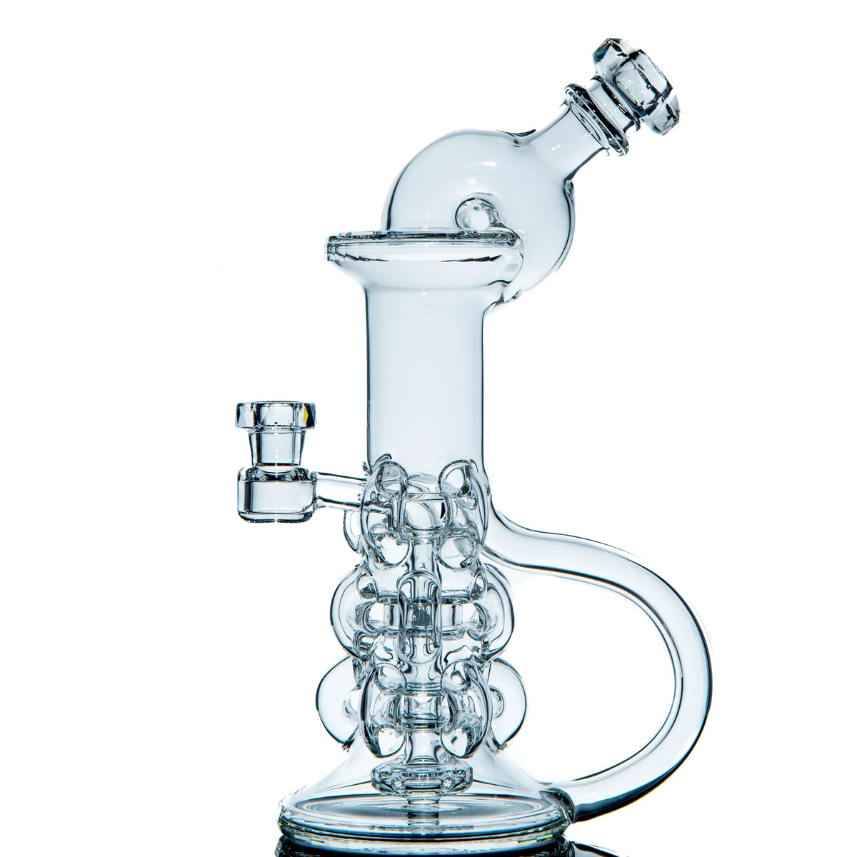 Clear glass recycler water pipe with intricate percolator design on white background