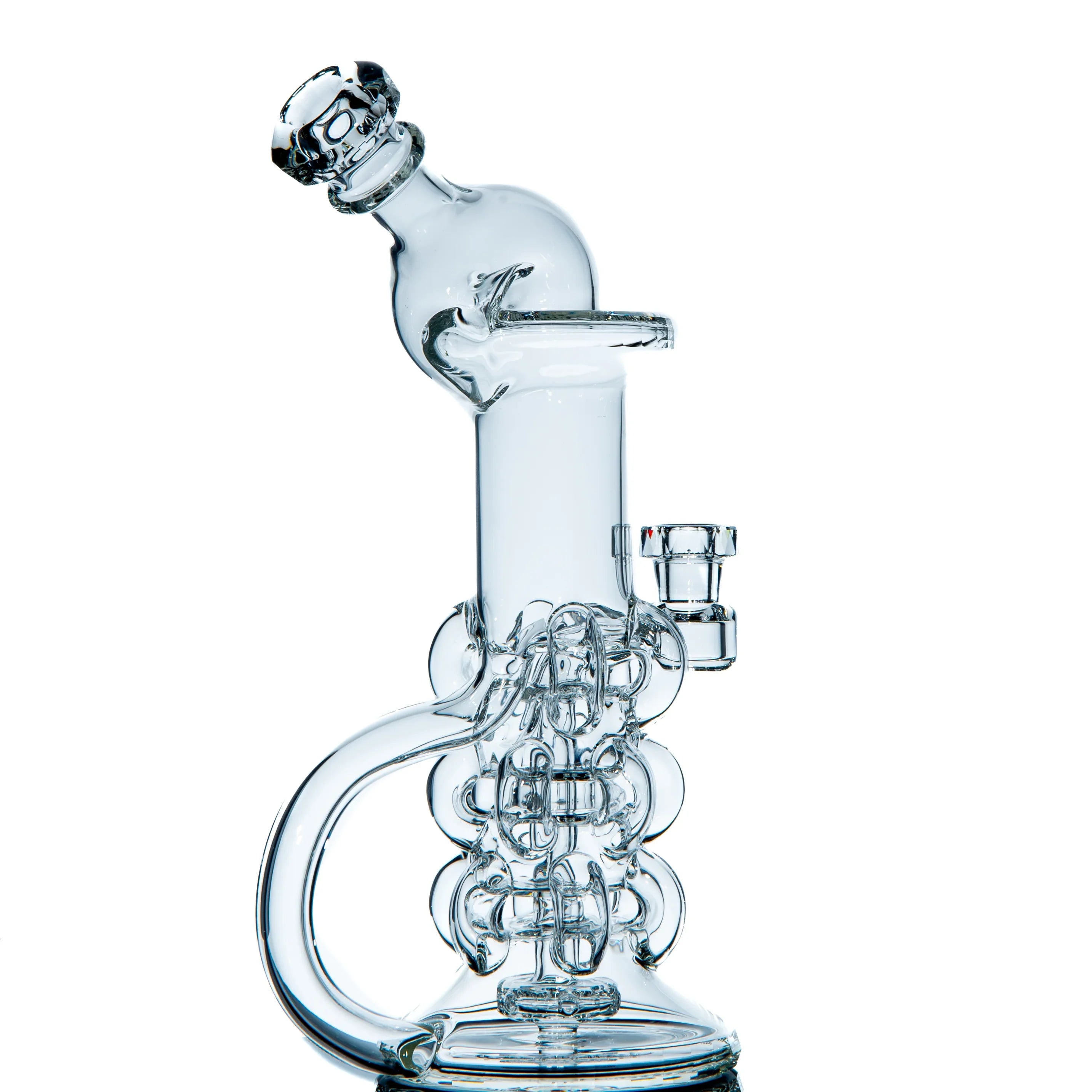Clear heady glass water pipe with intricate recycler design on white background