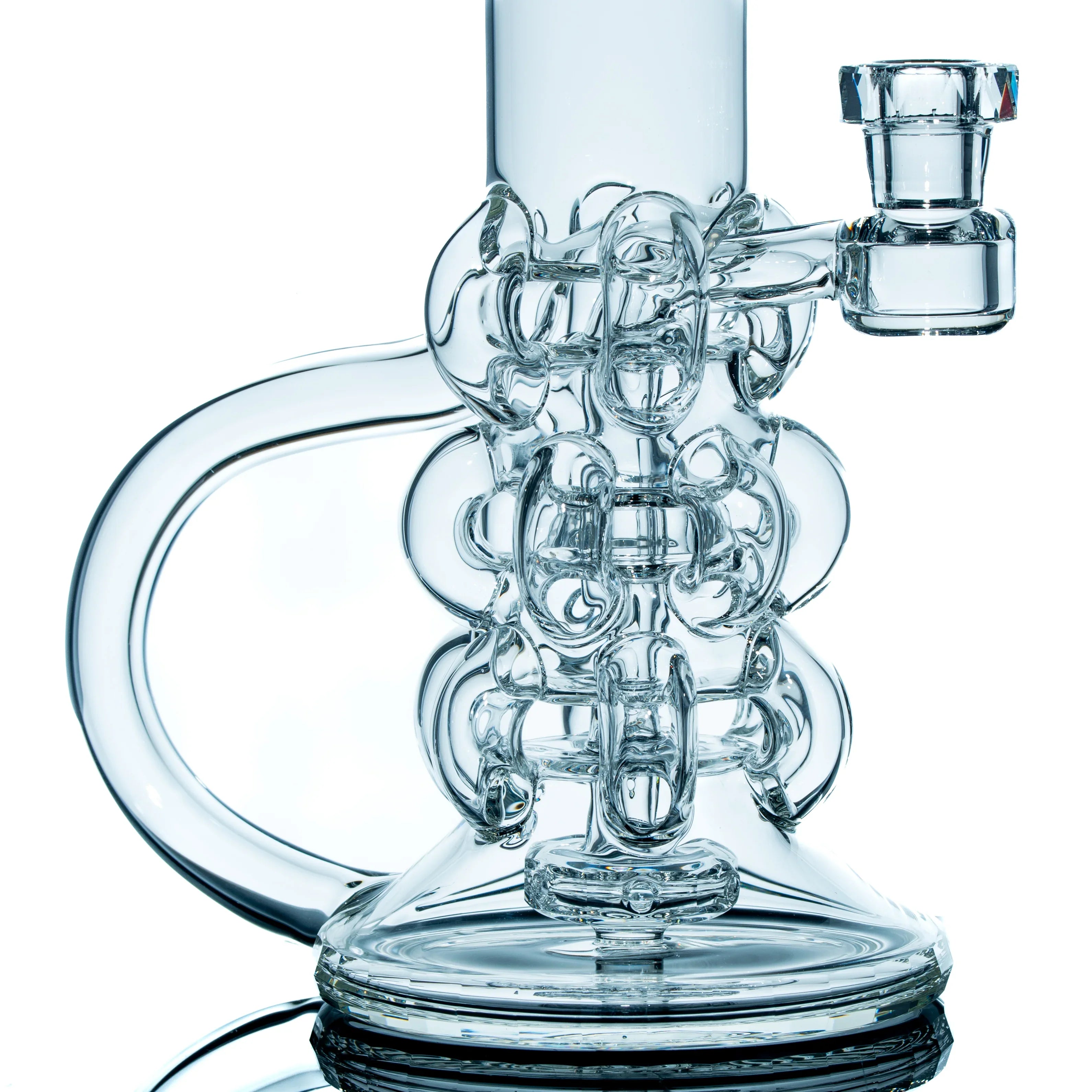 Intricately designed clear glass water pipe with artistic tubing and a wide base