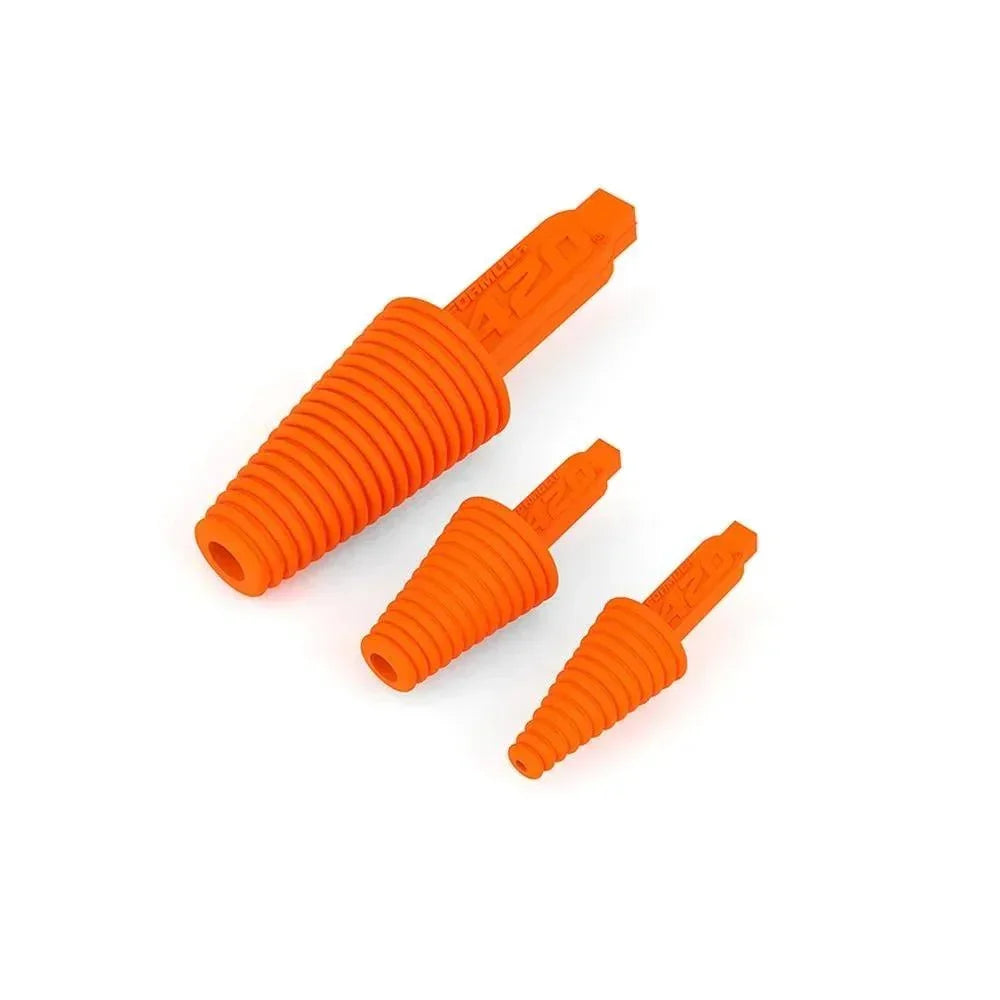 Set of three orange silicone glass cleaning caps in various sizes on a white background