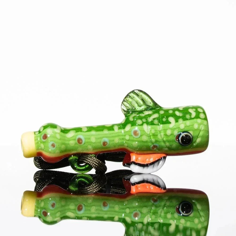Green glass pipe shaped like a brook trout fish, detailed fins and mouth, on white background.
