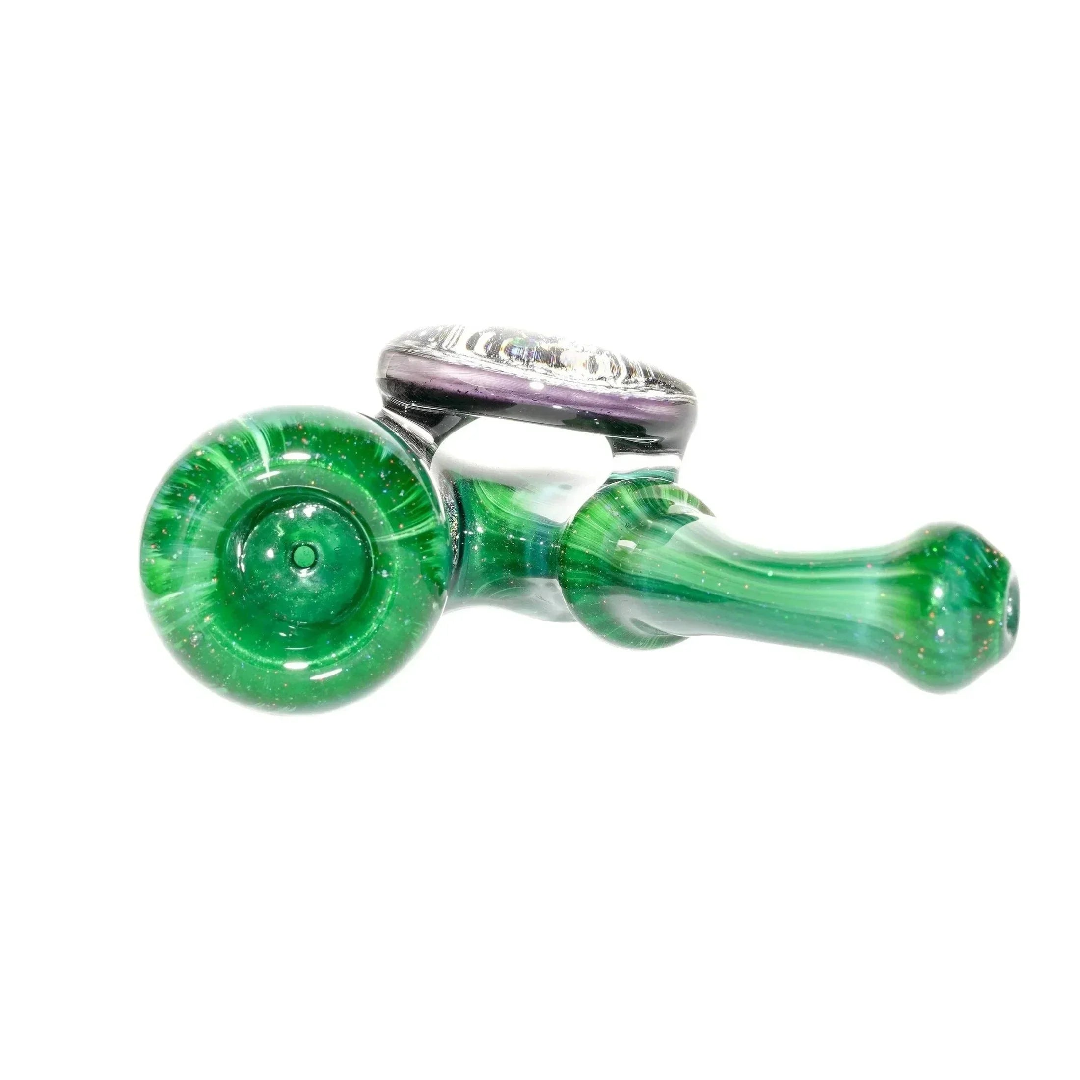 Green and purple glass hand pipe with unique design on white background