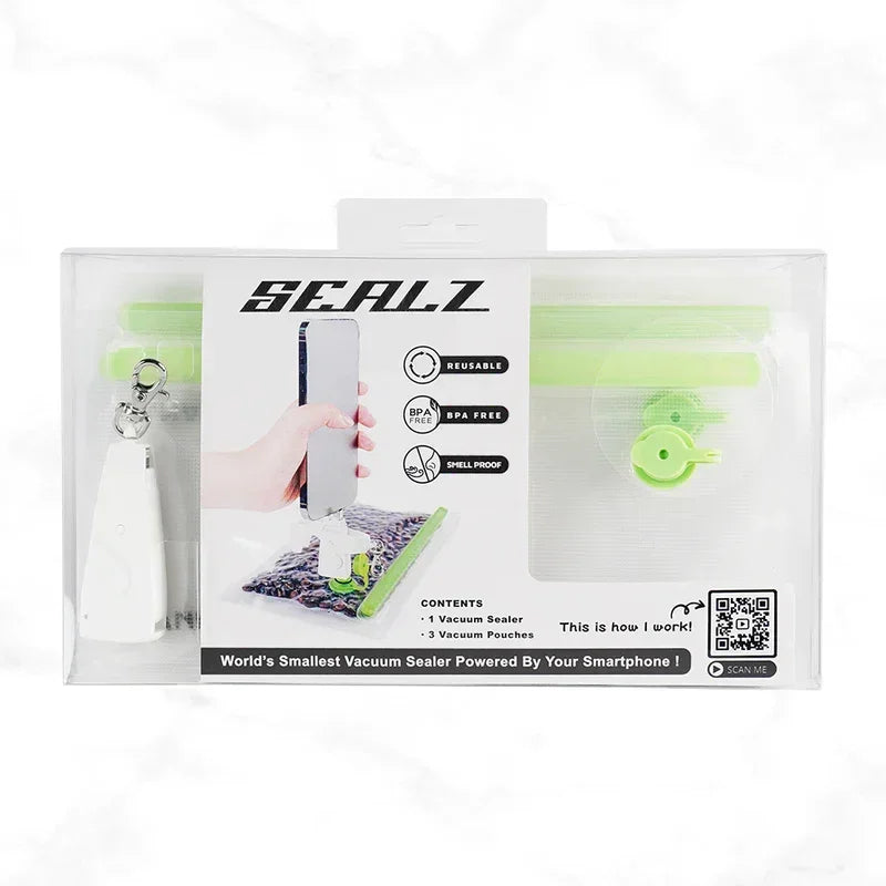 SEALZ portable vacuum sealer kit with green reusable BPA-free vacuum pouches in retail packaging.