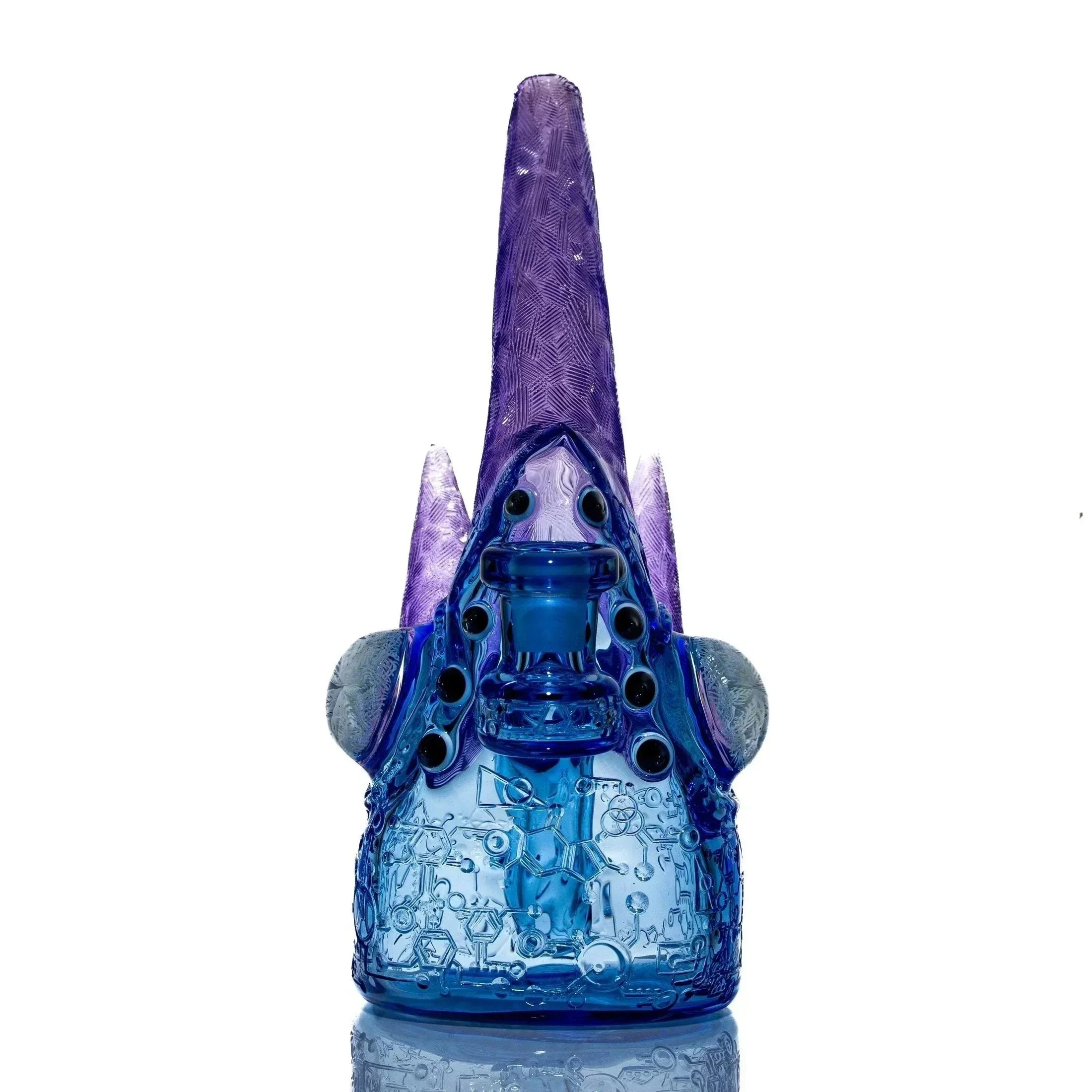 Colorful sculpted glass water pipe with blue and purple spikes and intricate textured design