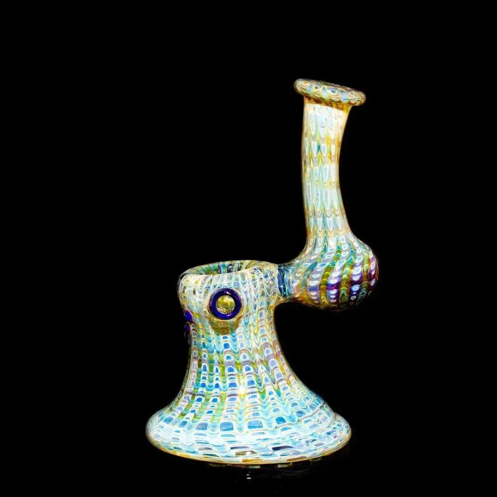 Colorful amber and blue glass bubbler pipe with textured patterns on black background