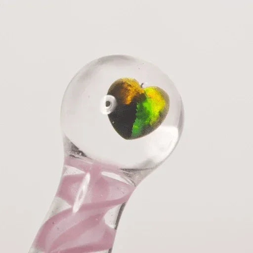 Clear glass pipe with heart-shaped dichroic accent and pink swirls, ideal for heady glass collectors