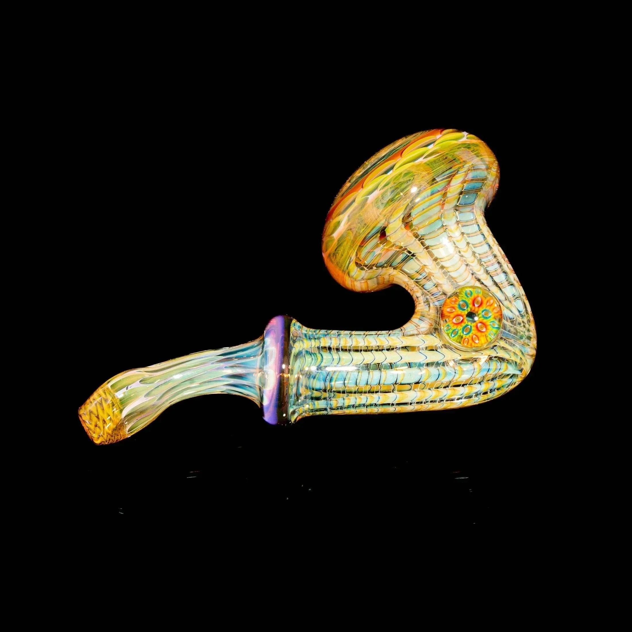 Colorful heady glass hand pipe with intricate patterns on a black background