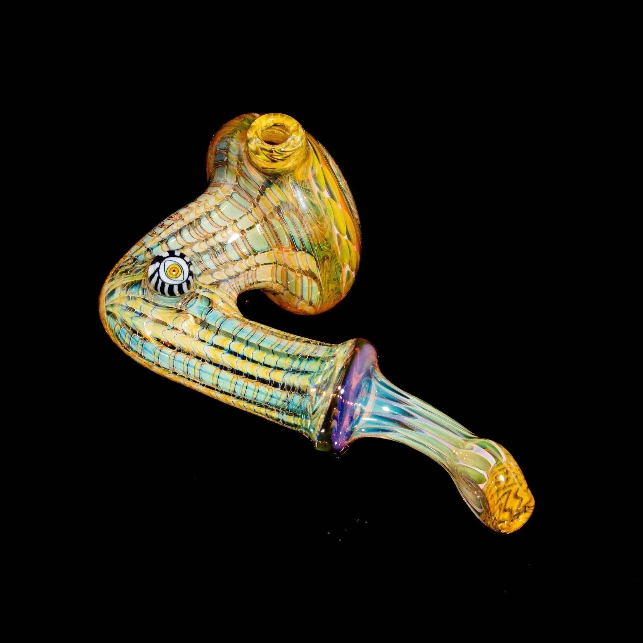 Colorful hand-blown glass pipe with intricate patterns on a black background
