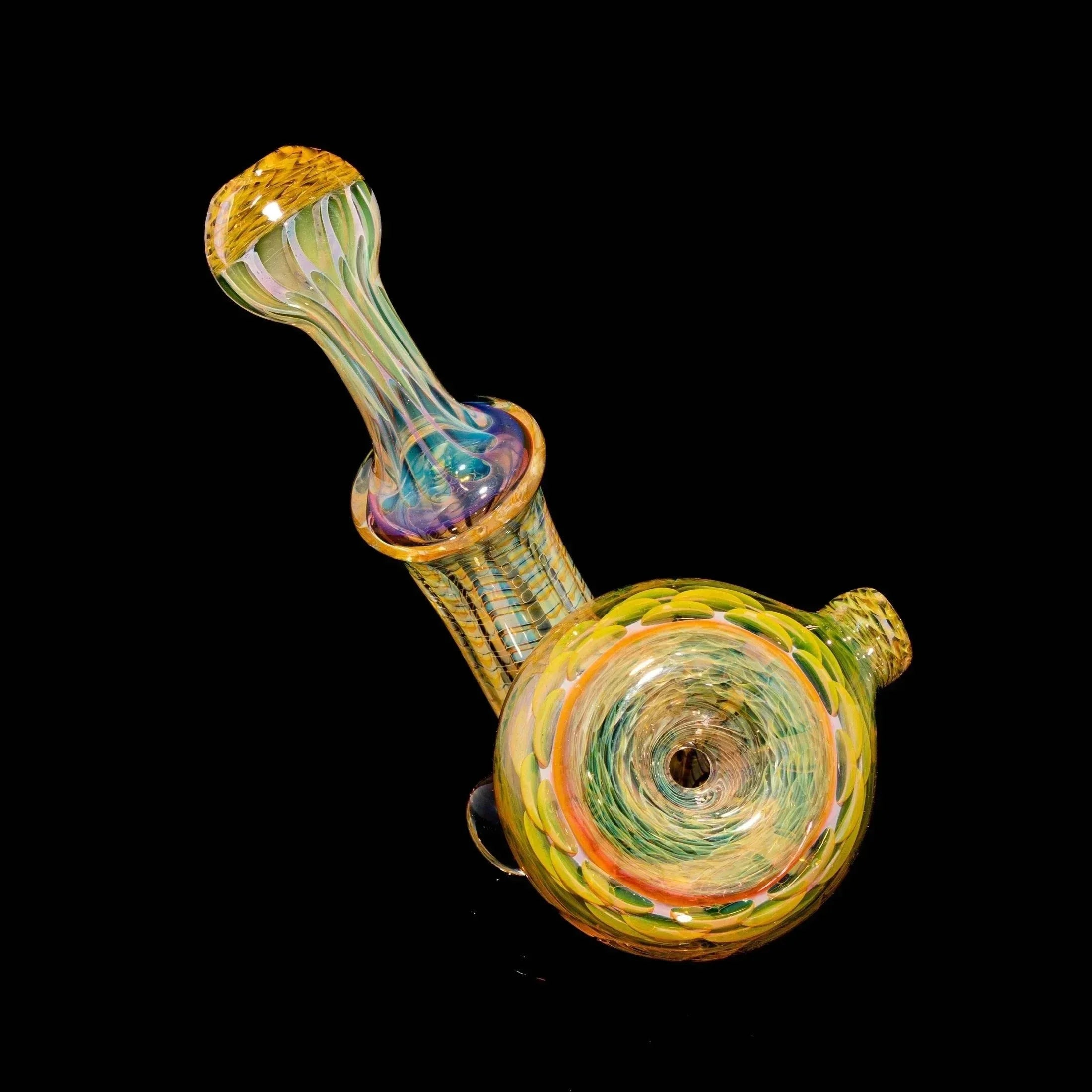 Hand-blown glass water pipe with colorful swirl patterns on a black background