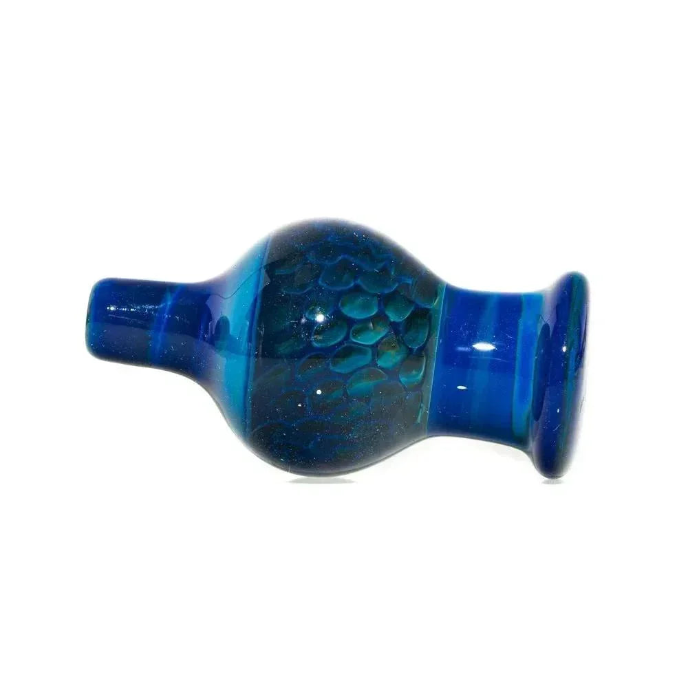 Intense blue and green glass bubble cap with beak shape and textured honeycomb design