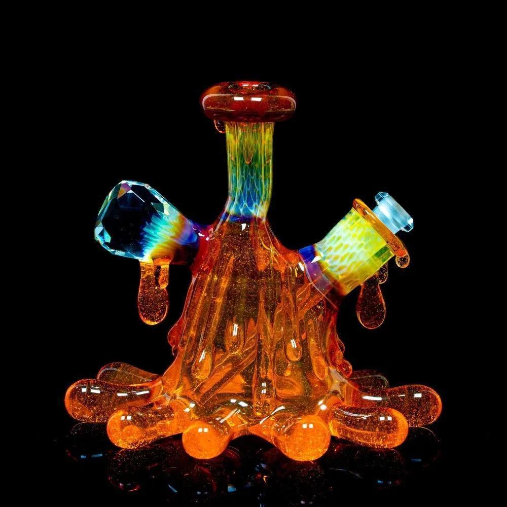 Colorful artistic glass water pipe with vibrant drip design and rainbow accents