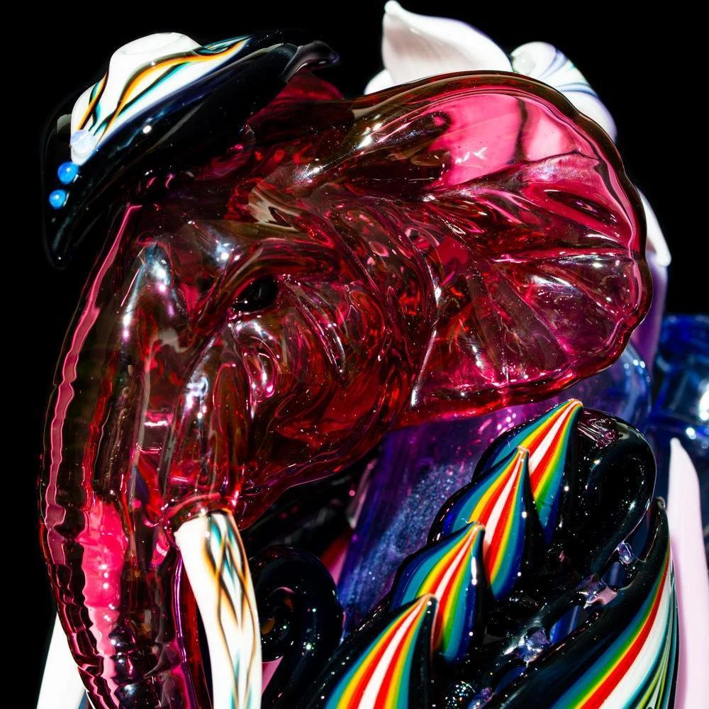 Colorful glass elephant recycler pipe with vibrant rainbow accents and intricate design