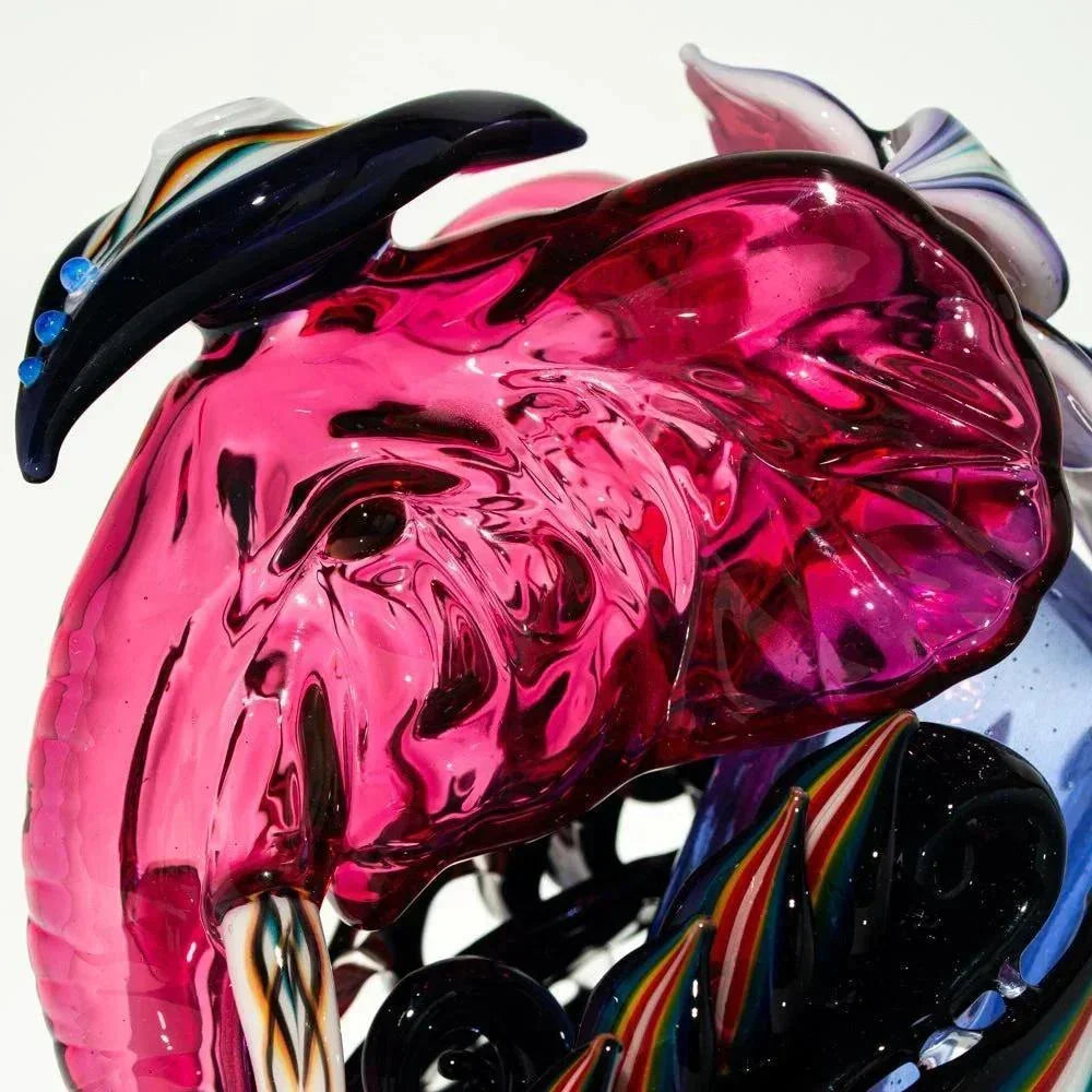 Colorful glass elephant recycler water pipe with vibrant pink, black, and striped details