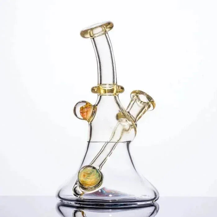 Clear glass bong with amber accents and dual chambers, ideal for heady glass collectors