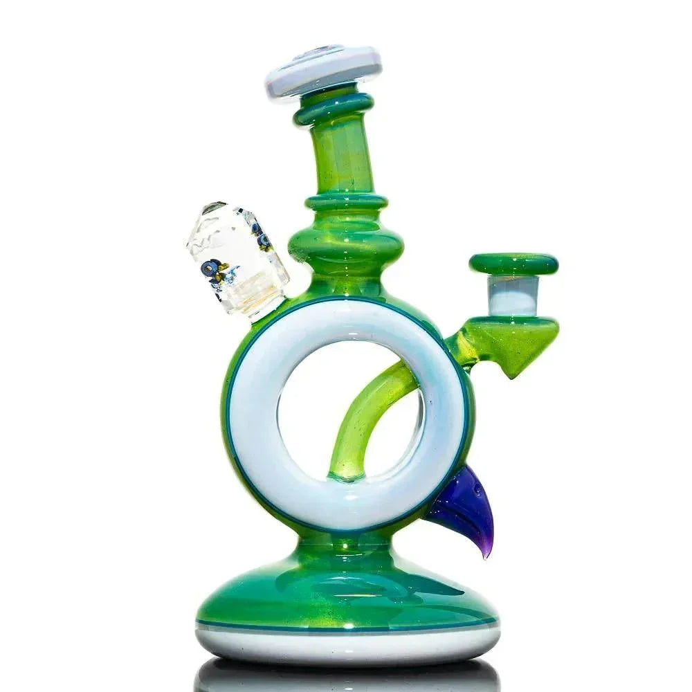 Green glass water pipe with circular design and clear accents on white background