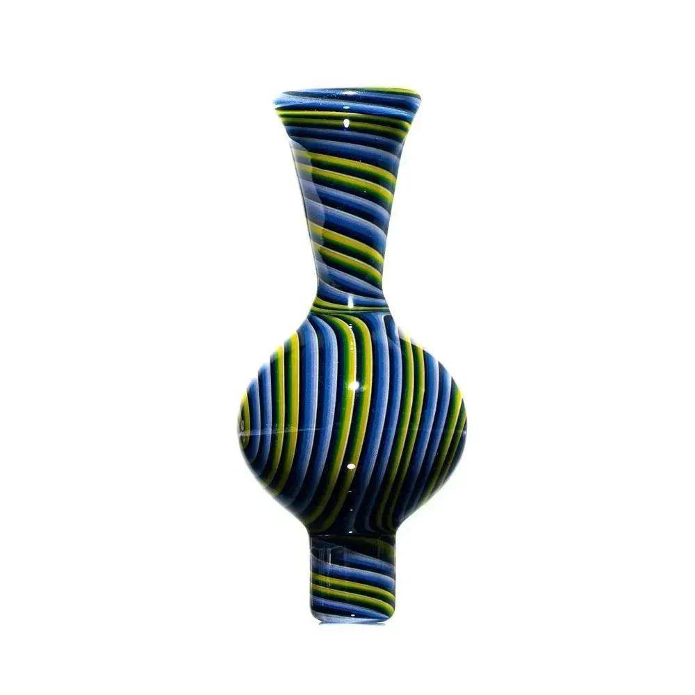 Colorful striped glass bubble cap with blue, green, and yellow swirling patterns
