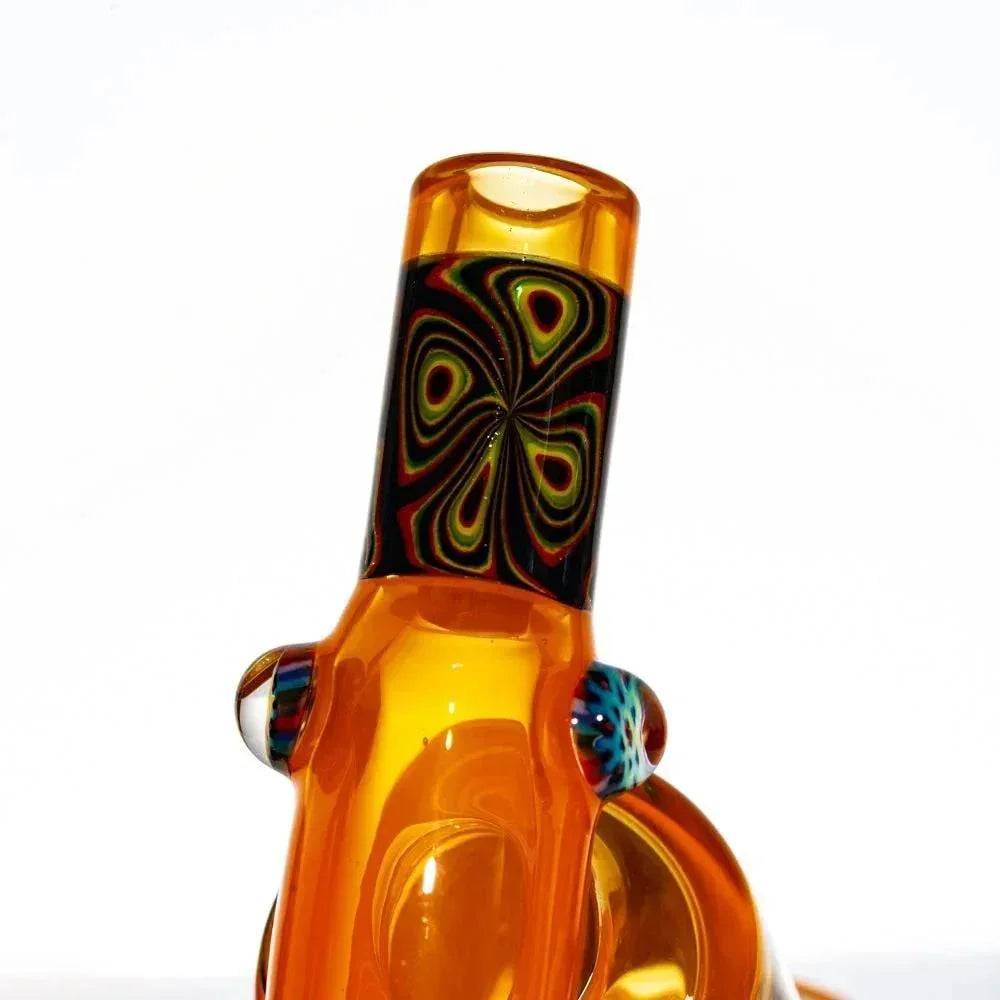 Amber glass mini water pipe with colorful psychedelic pattern and marbled accents