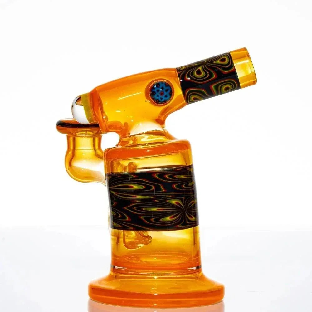 Colorful orange glass mini torch-shaped water pipe with intricate black pattern accents