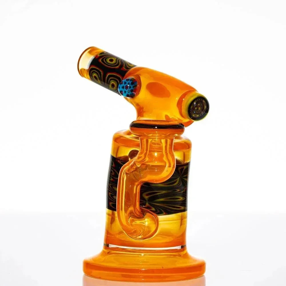 Amber glass mini torch with black and yellow accents, heady glass smoking accessory.